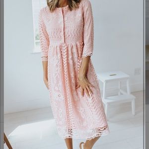 Light pink lace/embroidered tea-length dress with three-quarter length sleeves